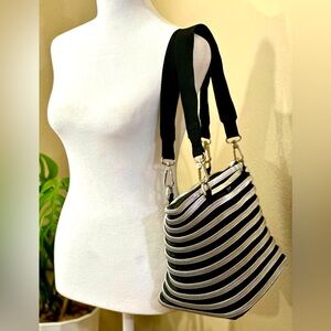 Black and silver Bam zipper purse.